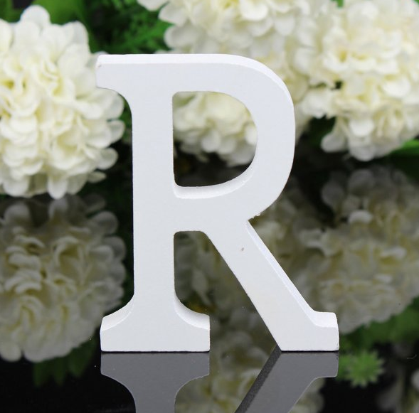 White letters in wood, approx. 8 cm high
