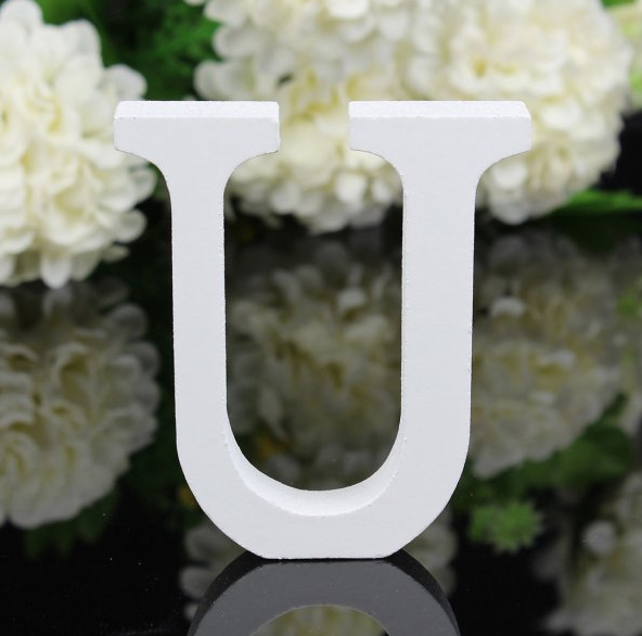 White letters in wood, approx. 8 cm high