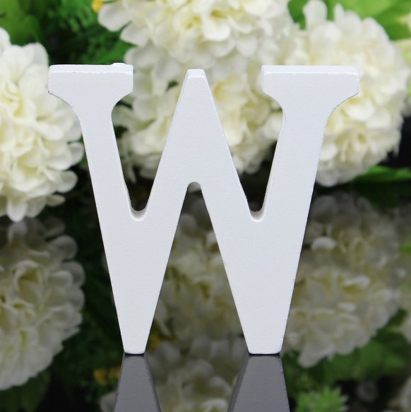 White letters in wood, approx. 8 cm high