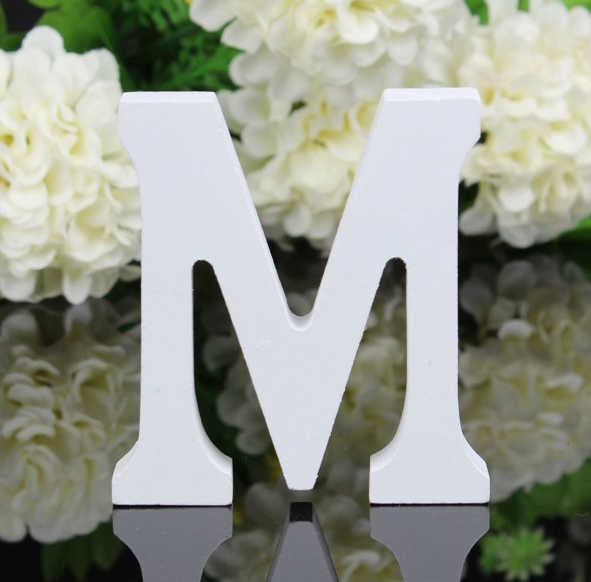 White letters in wood, approx. 8 cm high