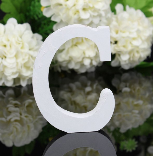 White letters in wood, approx. 8 cm high