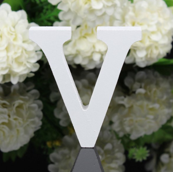 White letters in wood, approx. 8 cm high