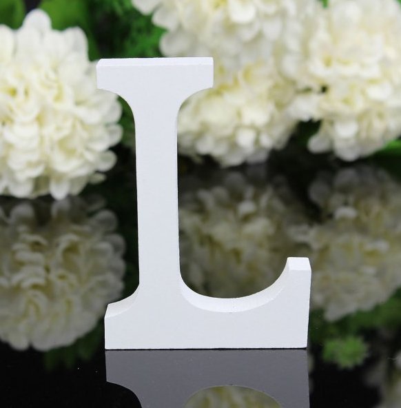 White letters in wood, approx. 8 cm high