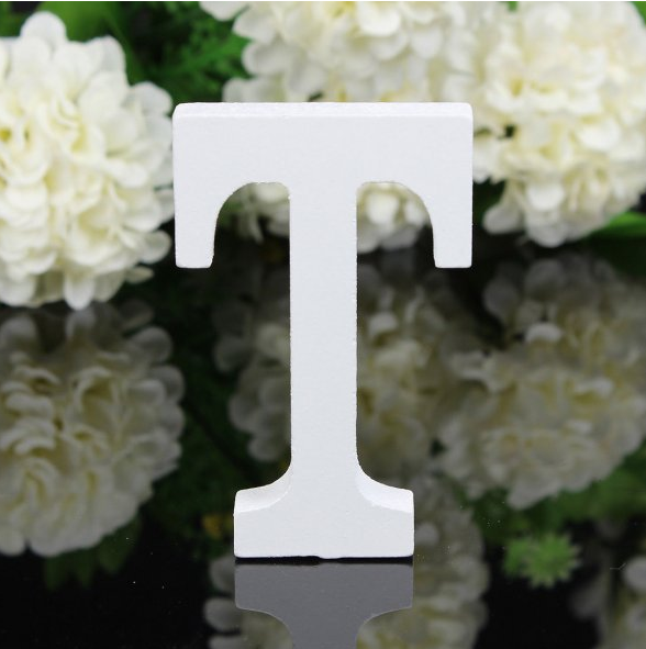 White letters in wood, approx. 8 cm high