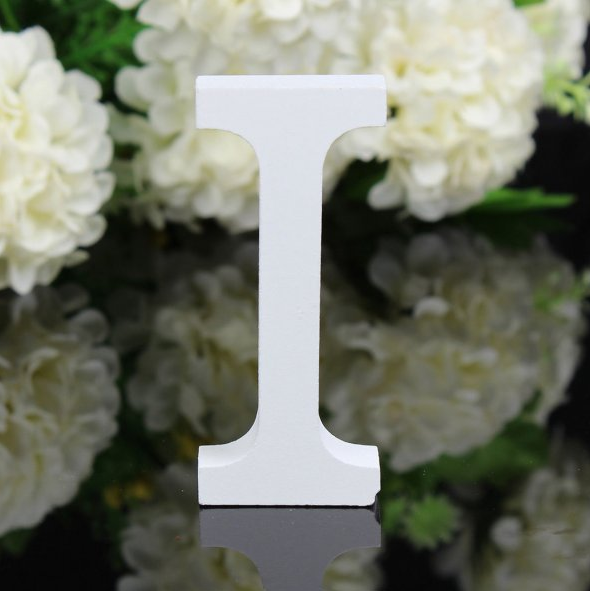 White letters in wood, approx. 8 cm high