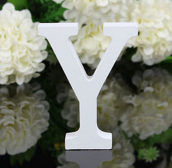 White letters in wood, approx. 8 cm high
