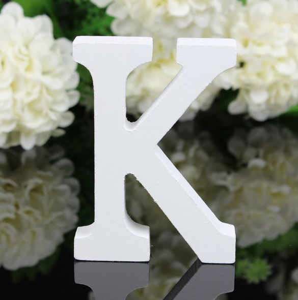 White letters in wood, approx. 8 cm high