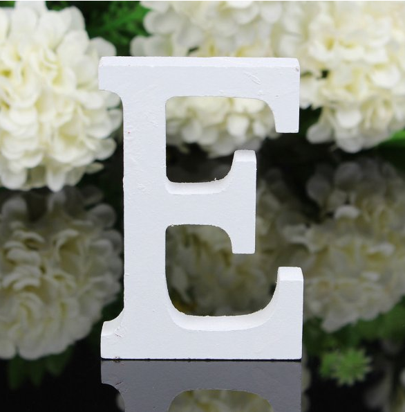 White letters in wood, approx. 8 cm high